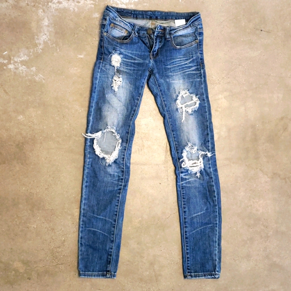 Machine distressed jeans